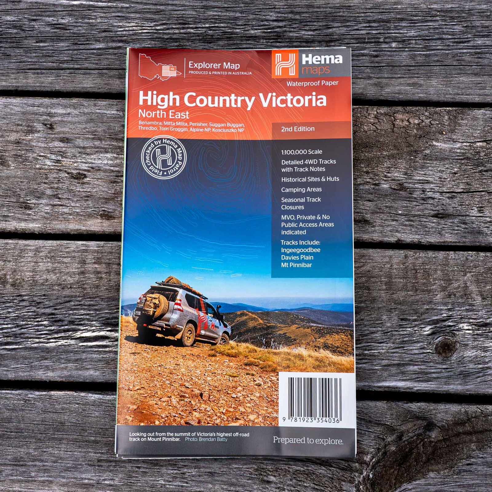 Hema High Country Victoria North East map, 2nd edition, folded on a timber table