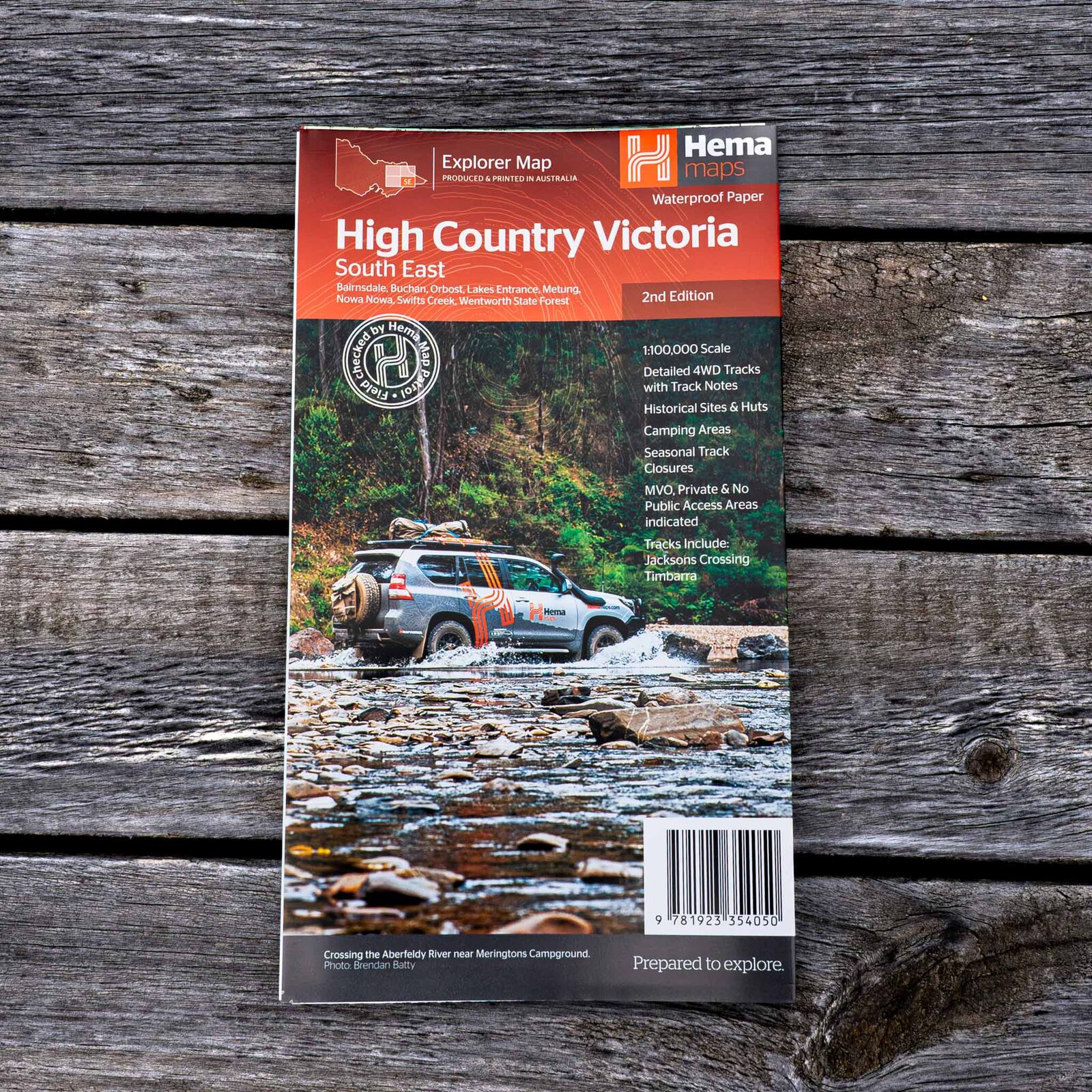 Hema High Country Victoria South East map, 2nd edition, folded on a timber table