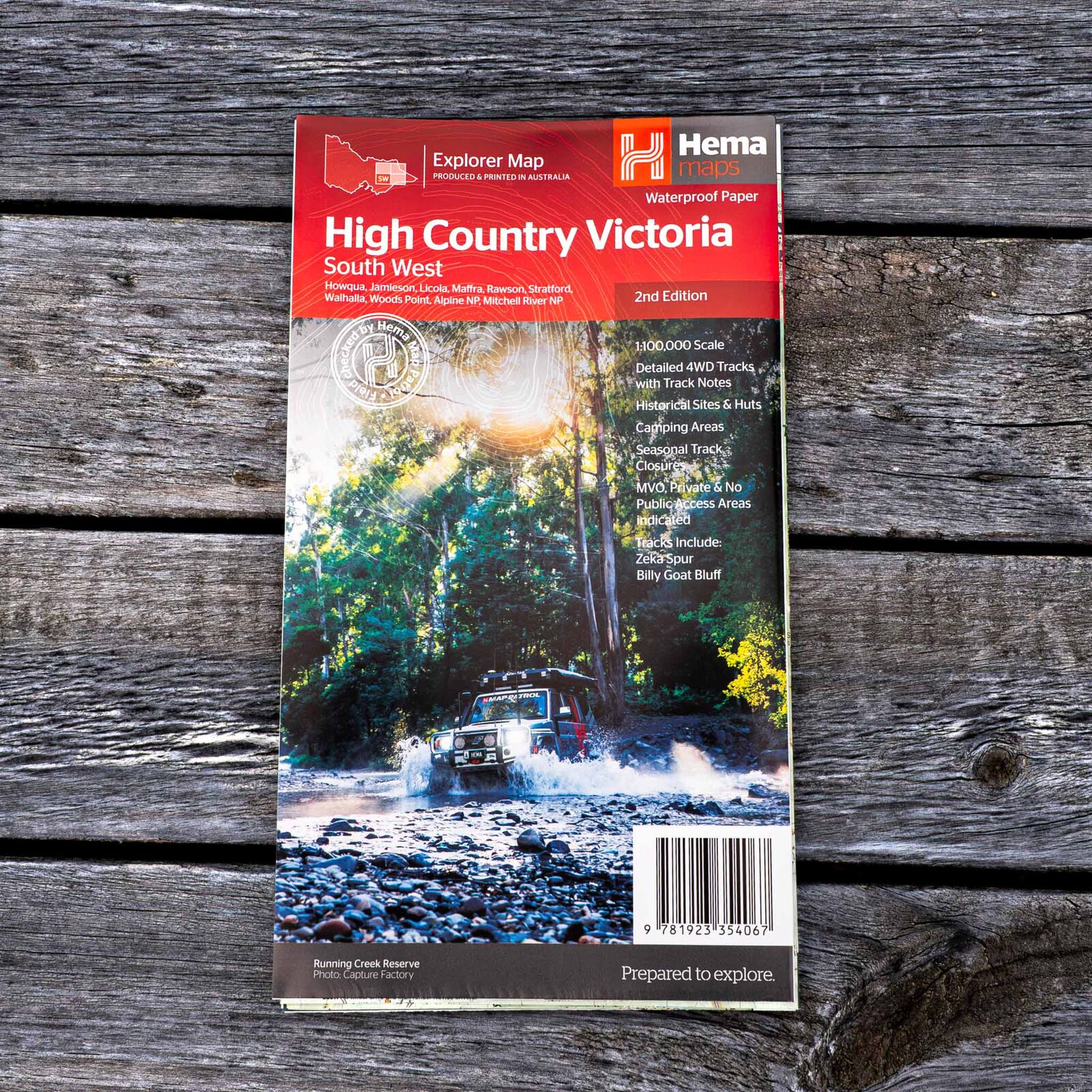 Hema High Country Victoria South West map, 2nd edition, folded on a timber table