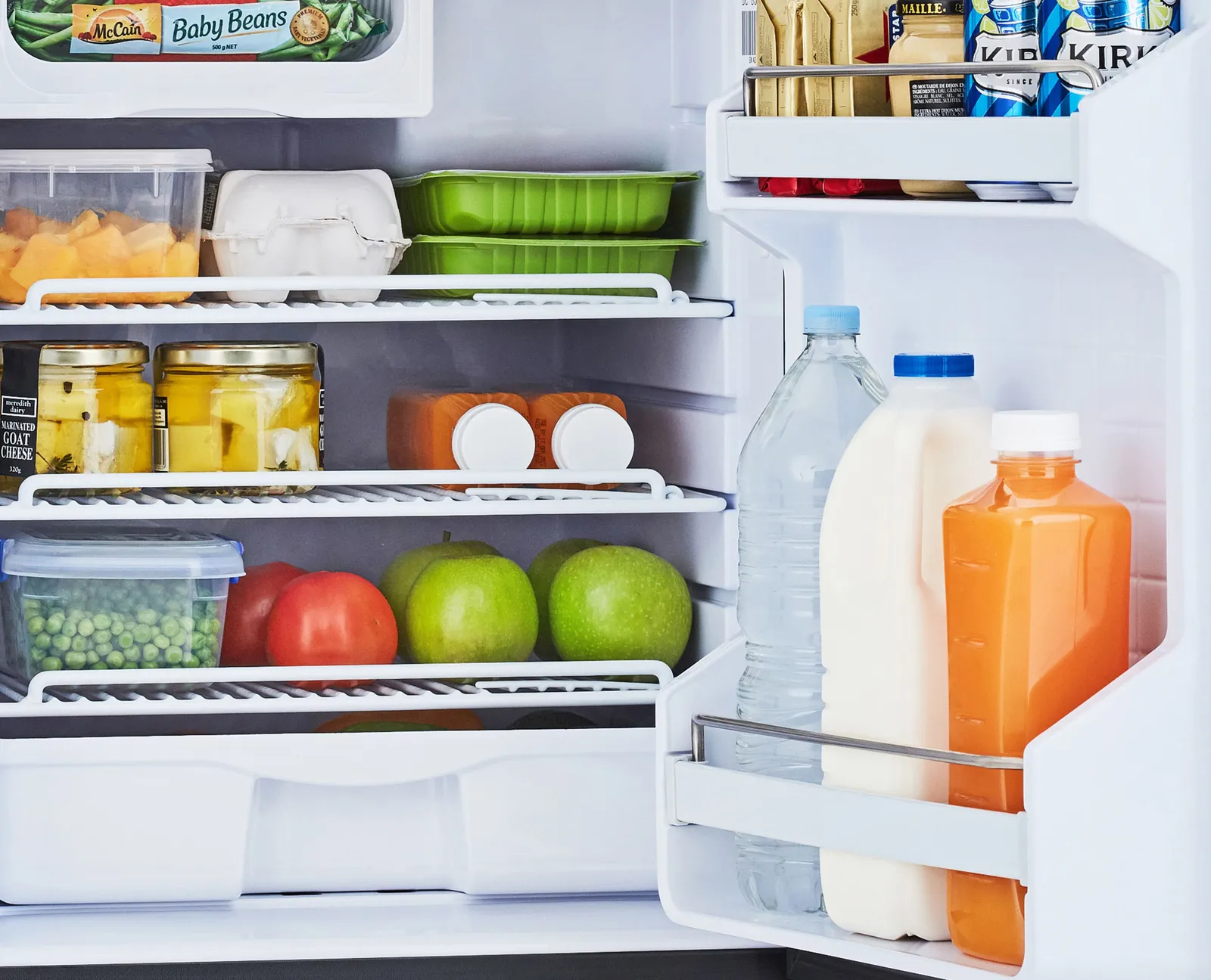 Bushman DC85-X door shelves holding 2L milk bottles